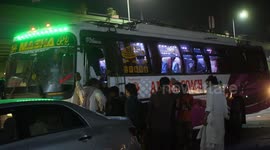 Rush to board busses in Pakistan ahead of Covid transport ban for Eid