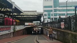 Antilockdownprotest- Thousands march past Brighton Station