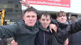 Derby County fans rush security as they celebrate staying in the Championship