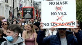 Hundreds of anti-lockdown protestors take to the streets of Brighton, England