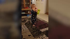 UK boy with cysts the size of grapefruit on his face defies odds to take first steps