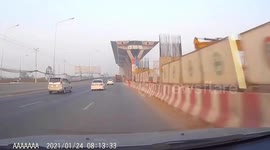 Road barrier spins towards oncoming car on road in Thailand