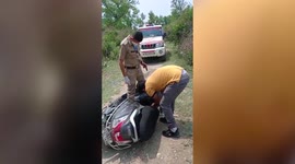 Forest officials rescue cobra from two-wheeler in northern India