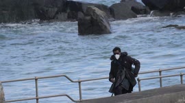 Black cast on house of Dragon and two princess`. Actors return by boat from a days filming of the Game of Thrones prequel on the tidal island of St Michael`s Mount in Cornwall UK