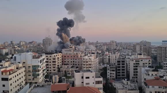 HD footage shows another complex in Gaza explodes and collapses after Israeli airstrike