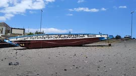 Abandoned Cayuco in the south of Tenerife on 14th May 2021, Spain.