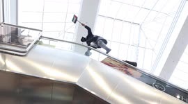 Manchester protester climbs onto escalator rail at Arndale shopping centre during pro-Palestine march