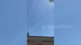 Israelis run to air raid shelter as Palestinian rockets fly overhead