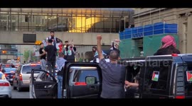 Motorists honk their horns in support of 'Free Palestine' protest in Calgary, Canada