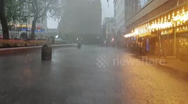 Torrential rain marks London's first day out of lockdown