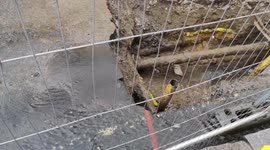 Massive Hole In Whitehall gets Filled With Rainwater