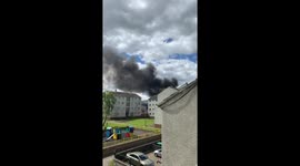 Explosions heard as vehicles catch fire near Edinburgh shopping centre