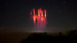 Bizarre alien like Red Sprite electrical discharge above a Kansas thunderstorm wow a storm chaser!