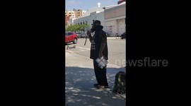 Protester against Israel speaking outside San Diego Police Headquarters, USA