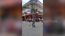 Funky traffic cop directs cars with the power of dance in the Philippines