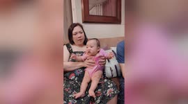 Baby has HILARIOUS reaction when male relatives try to kiss her