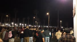 Party-goers create chaos at Huntington Beach after responding to viral video invitation