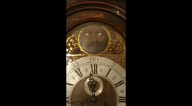 Would you have this shifty-looking grandfather clock in YOUR home?
