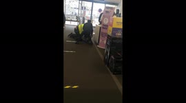 A man tries to run away after pulling knife on a lady inside a shop