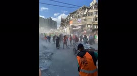 Gaza. People are rebuilding the destroyed Omar Mukhtar Street