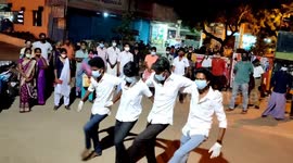A group of Youngsters dance in the middle of the road to create awareness on the extended lockdown that starts from May 24 in Tamilnadu