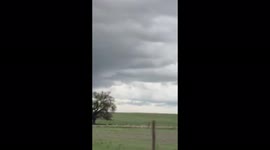 Watch as storm chaser captures stunning footage of rotating funnel cloud in Colorado