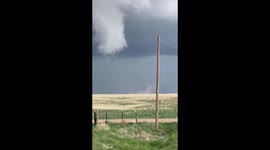 Stunning tornado footage as storm chaser captures rotating funnel cloud in Colorado
