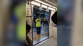 Emergency crews attend wounded after train collision injures over 200 people in Malaysia