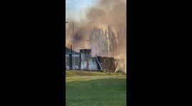 Fire fighters fighting fire at Victorian mill in Bradford