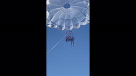 US woman shares terrifying moment her harness malfunctioned while parasailing