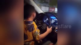 Footage shows 6-year-old boy steering car while on road in southern China