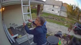 Man falls off ladder captured by CC tv