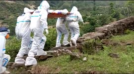 Heroic officials trek 7 kms in the Himalayas to bring 82-year-old COVID-19 patient to the hospital