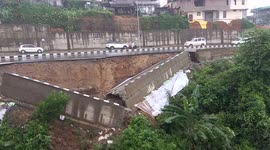 Portion of road caves in after days of Incessant rains in Itanagar, India