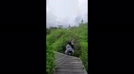 Hilarious moment Indonesian model falls into swamp while filming for TikTok