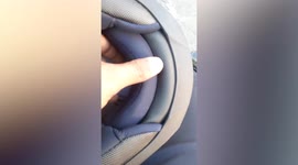 Motorcycle rider found mouse hiding inside helmet while riding