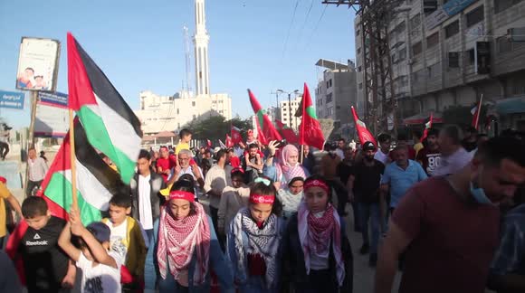 Palestinians supports of Popular Front (PFLP) attend an anti-Israel rally in Gaza