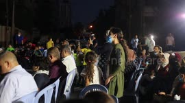 Singers sing for the homeless in the ruins of their homes in Gaza