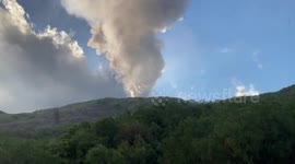 Mount Etna spews black volcanic soot all over Italian countryside