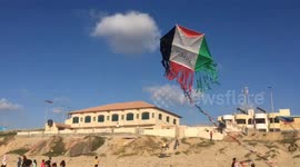 Gaza's children fly Palestinian flag kites as ceasefire enters second week
