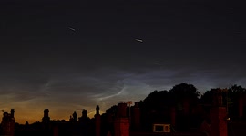 Rare high-altitude polar noctilucent cloud display dazzles Europe
