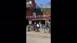 Young man stabbed in middle of busy market street in Brixton, in daytime