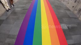 Walk through tunnel decorated with rainbow flag to mark Pride month in Bangkok