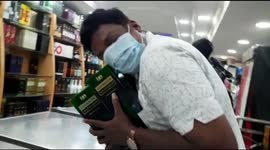 Indians excitedly line up at liquor store after 40 days of pandemic prohibition