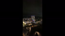 Illuminated shelf cloud tracks into Austin
