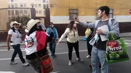 Flor de los Milagros Contreras León, leader of extremist group linked to Fuerza Popular, La Resistencia, argues with Peru Libre's supporters.