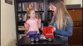 Little Girl With Her New Toy