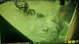 Watch moment woman disappears into flooded manhole after Mumbai is hit by heavy rain