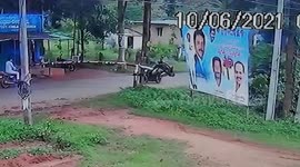 Pillion rider smuggling cannabis rams into check post barricade in southern India