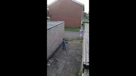 Gangster granny abuses kids as try to retrieve ball off garage roof,